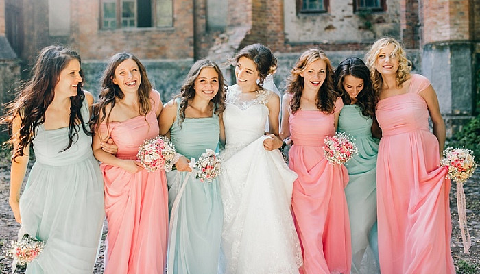 Beautiful bride with her pretty bridesmaids