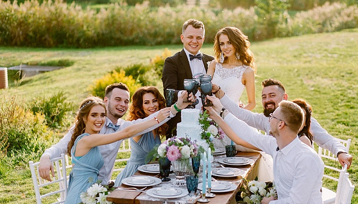 guests celebrating at the table the wedding of their friends