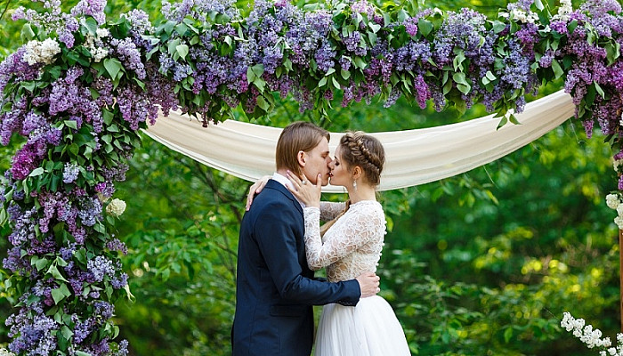 Happy couple on spring wedding ceremony