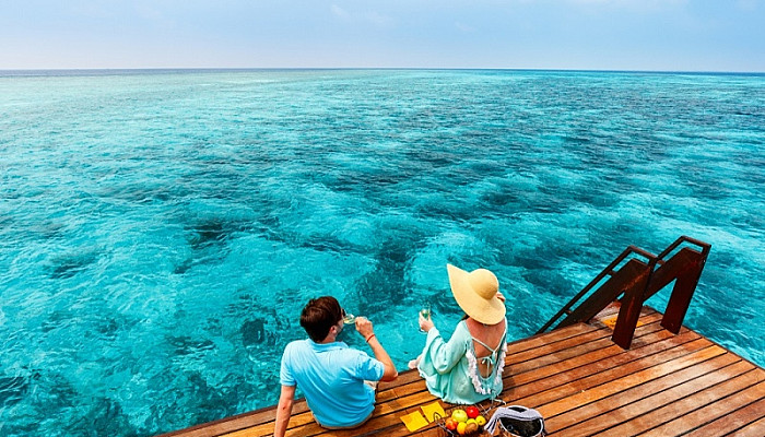 Couple at tropical resort during honeymoon vacation