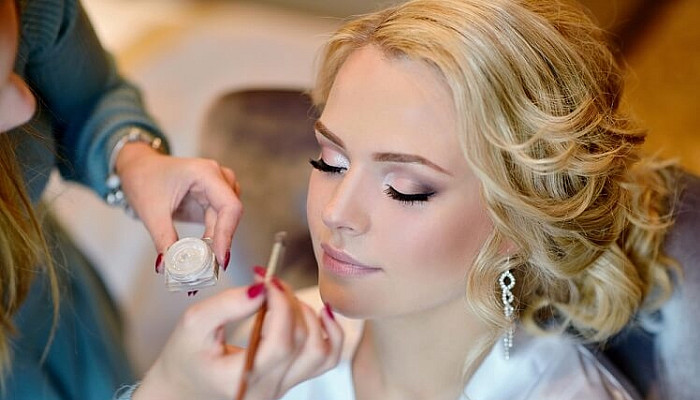 wedding makeup artist making a make up for bride-Bridal