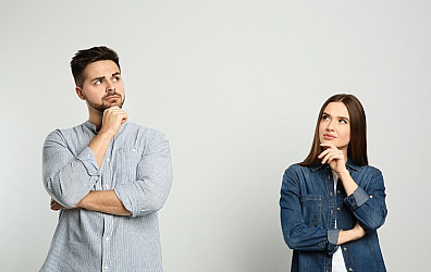 Pensive couple thinking about answer for question